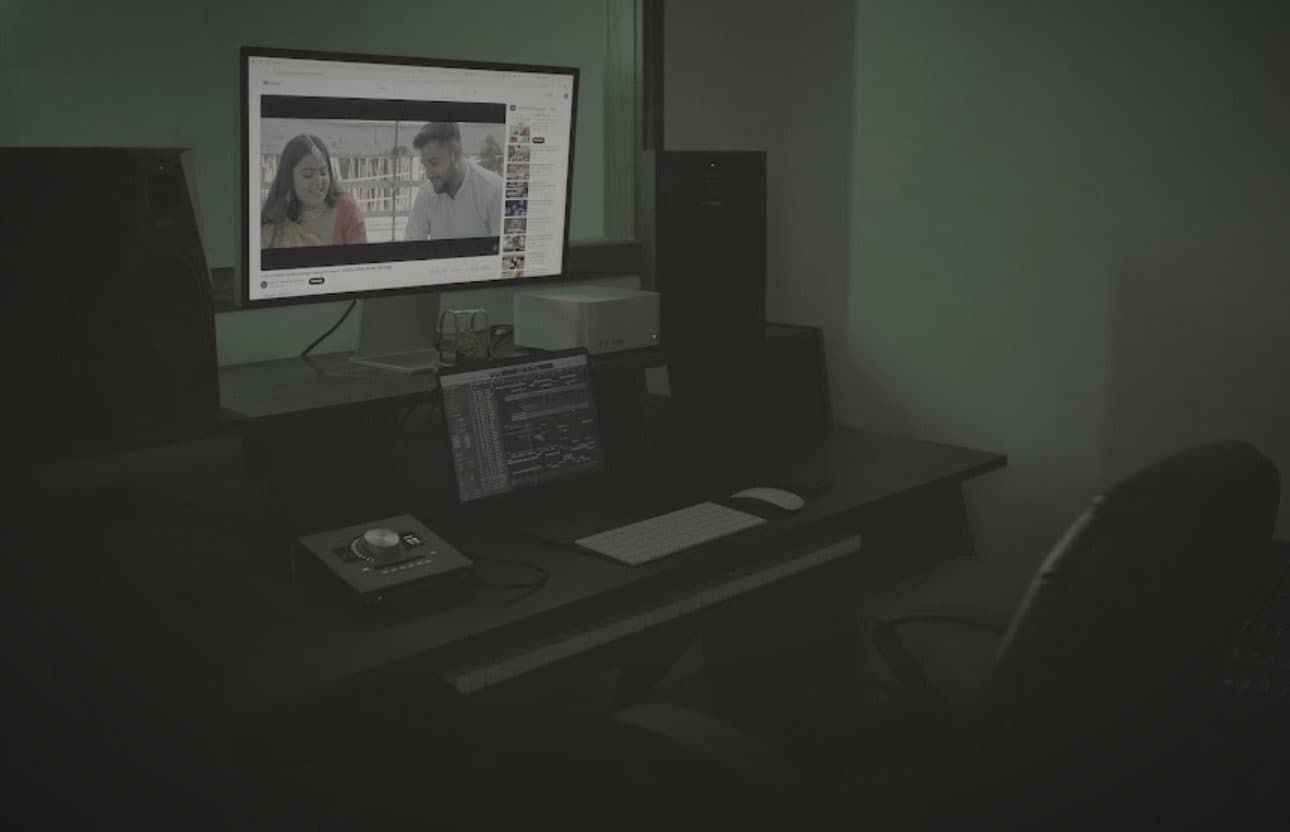 The Antraalaap control room after dark, reference monitors either side of the main display
